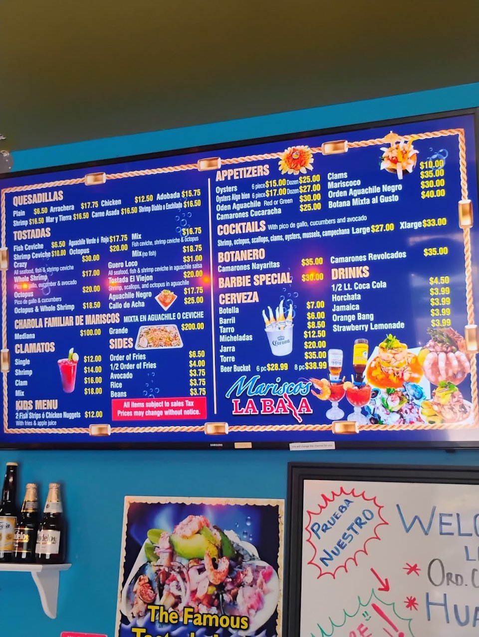 Printed menu with seafood and beverage sections